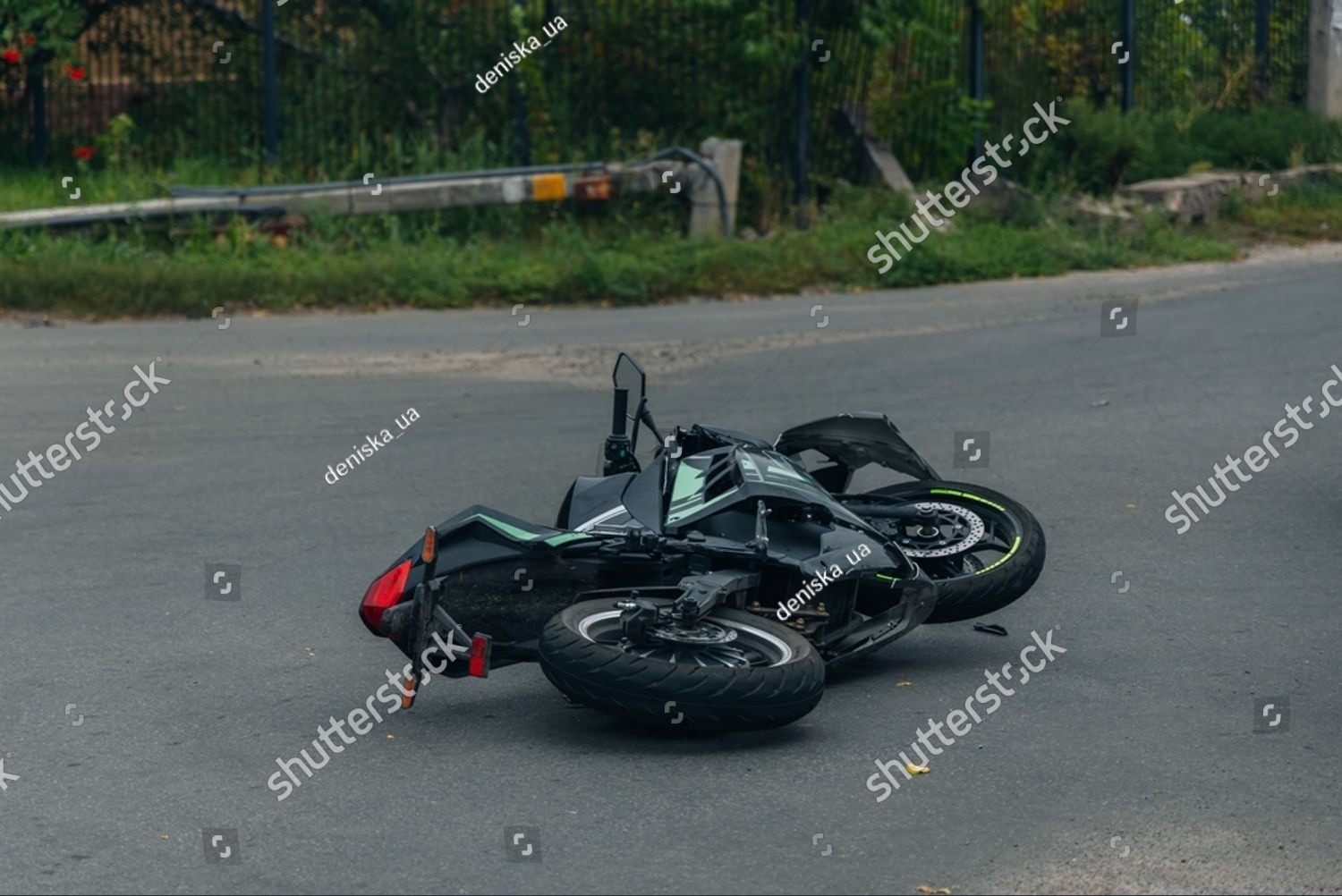 Motorcycle lying on the road after an accident