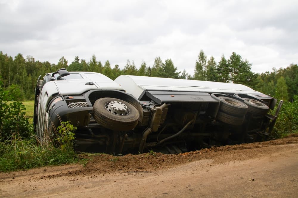 A toppled truck in a traffic accident scene in Denver, Colorado