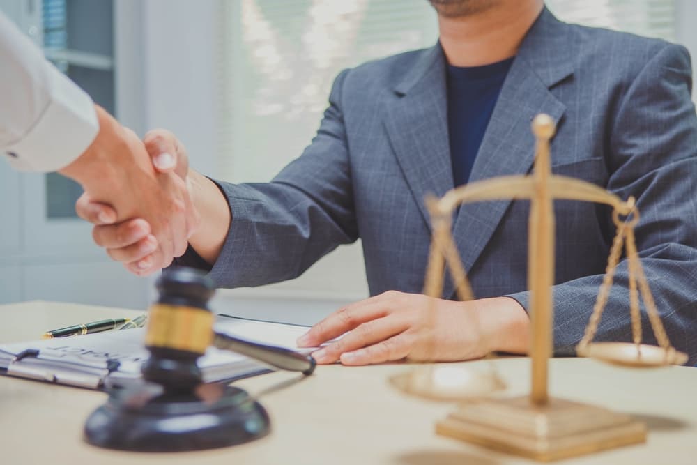 How a personal injury lawyer strengthens your case and protects your rights. Personal injury lawyer meeting with an accident victim to review legal rights, negotiate with insurance companies, and build a strong compensation claim.