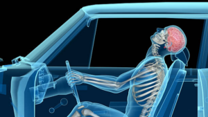 A car driver using mobile while driving.